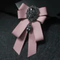 Men's pink ribbon bow tie with black rhinestone crystal brooch for stage performance. - Pink