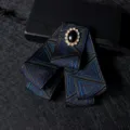 Men's blue geometric patterned bow tie featuring sparkling crystal center for formal wear. - Colorful Triangle Blue