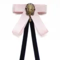 Vintage academic style pink ribbon bow tie with vintage cameo brooch for women uniform. - Pink Mesh
