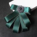 Dark green ribbon bow brooch with crystal rhinestone center for men suit and formal wear. - Gold-rimmed Green
