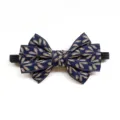 Close up detail view of children navy blue bow tie with golden leaf pattern and elastic band. - Leaf Blue