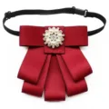 Burgundy ribbon bow tie with pearl rhinestone center and adjustable elastic neck strap. - Bow Tie / Red