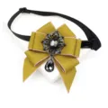 Detailed view of the vintage style children ribbon bow tie with sparkling dark rhinestones. - Pink Edge Turmeric