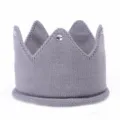 Close-up detail of grey knitted crown hairband with sparkly crystal rhinestones, soft texture. - Gray Rhinestone