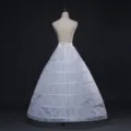 Detail shot of white multi-hoop wedding crinoline petticoat with adjustable elastic waist. - Laced Six Steel Rings