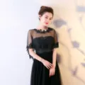 Elegant black lace bridal shawl and evening dress set, featuring delicate mesh and embroidery. - Black