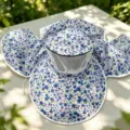 Detail view of the floral sun hat with wide brim, breathable mesh and protective neck flap. - M (56-58cm) / Large Blue Floral