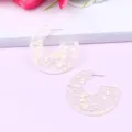 Transparent C-shaped acrylic earrings with sparkling glitter flakes, minimalist geometric design. - Color 5