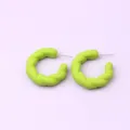 Vibrant candy green twisted hoop earrings for women, stylish acrylic C-shaped jewelry. - Green