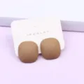 Candy color geometric square acrylic stud earrings with multi-faceted painted finish. - Cyan