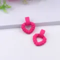 Pink matte heart-shaped drop earrings close up detail, stylish acrylic daily jewelry piece - Rose Red