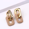 Boucles d'oreilles chaînes rectangulaires chics au design bicolore métallique et mat pour femmes. - Marron