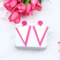 Stylish geometric triangle earrings with vibrant pink and mirror gold finish for women. - Solid Rose Red