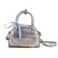 Stylish silver crossbody handbag for women with cute lace trim and chic blue ribbon bow. - Silver