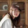 Brown cotton baseball cap for women, featuring chic embroidered Paris French letters and sun protection. - Adjustable Head Circumference / Coffee