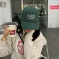 Green cotton baseball cap for women, classic embroidered letter design, stylish daily sun hat. - Adjustable Head Circumference / Dark Green