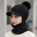 Black knitted visor beanie with fleece lining detail showing warm winter hat design - One Size / Black