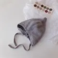 Joli bonnet bébé tricoté avec liens, bonnet d'elfe en laine chaude pour nouveau-né automne. - Gris