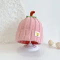Pink knitted pumpkin baby hat with cute cartoon patch for autumn and winter warmth. - Pink Pumpkin Hat