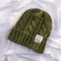 Green cable knit beanie for women, cozy winter slouchy warm hat with stylish patch detail. - Butter Green