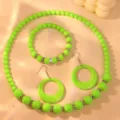 Neon green acrylic bead necklace bracelet and large hoop earrings jewelry detail view. - Lime Green Set