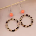 Retro leopard print acrylic dangle earrings with vibrant orange beads for women fashion. - Brown