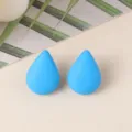 Close-up detail of minimalist blue teardrop acrylic stud earrings, stylish daily jewelry. - Sky Blue