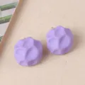 Closeup of purple irregular geometric acrylic stud earrings featuring a minimalist candy color design. - Purple