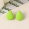 Close-up detail shot of minimalist teardrop green acrylic ear studs, fresh everyday jewelry. - Green