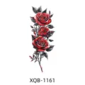 Temporary tattoo sticker featuring three red roses and dark leaves, stylish body art design. - Realistic Red Rose (XQB-1161)