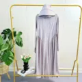 Detailed view of the long hooded sun protection dress with front zipper and pleated hem design. - Taro Purple