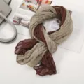 Close-up detail of soft pleated two-tone scarf in khaki and brown, showing voile texture. - Floral Pleated Style 3 Burgundy Beige