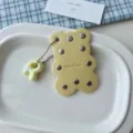 Yellow leather bear keychain with metal rivets and cute pendant accessory variant. - Yellow