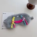Cute funny grey plush sleep eye mask with cartoon mouth and braided hair styling. - Braid Style / Gray