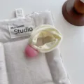 Süßes bonbonfarbenes Haargummi mit rosa runder Perle und breitem Elastikband für Frisuren. - Milchgelb