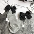 Grey cotton crew socks featuring a large black bow detail at the back, cute style. - One Size / Light Gray + Black Bowknot
