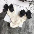Cute Japanese style women cotton socks with large black striped bows, sweet rolled edge design. - One Size / Milky White + Black Bowknot