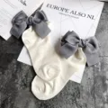 Charming white cotton socks featuring large grey bow decorations, sweet Japanese style detail. - One Size / Milky White + Gray Bowknot
