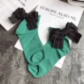 Japanese sweet style green cotton crew socks featuring large black bow with white dots detail. - One Size / Dark Green + Black Bowknot