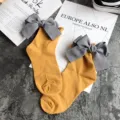 Chic Japanese style cotton socks for women featuring lovely large grey bowknots. Cute sweet style. - One Size / Ginger Yellow + Gray Bowknot
