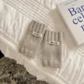 Guanti a mezzo dito in maglia grigia da donna, scaldapolsi invernali eleganti e caldi. - Taglia unica / Grigio chiaro