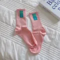 Roze middellange casual sokken met schattig smiley label voor dagelijks gebruik style. - Eén maat / Lichtroze