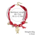 Red bandana fabric necklace with nautical charms, fish skeleton and shell pendants for summer. - Red Island Fish Bone (N2511-16)