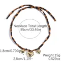 Leopard print fabric scarf necklace featuring gold heart pendants, stylish accessory. - Wild Spots Multiple Hearts (N2506-6)