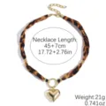 Chic leopard print fabric scarf necklace with gold heart pendant and extension chain. - Wild Spots Heart Shadow (N2506-5)