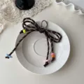 Geflochtener Schleifen-Schlüsselanhänger mit bunten Perlen süßer Taschenanhänger - Kaffee