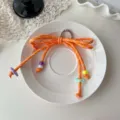 Dopamine colorful woven bow keychain with cute beads and metal ring for bags and keys. - Orange