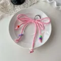 Pink braided bow keychain with colorful beads, cute sweet bag charm for stylish girls. - Light Pink