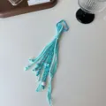 Blue braided keychain lanyard with lace ribbons and beads, stylish bag pendant accessory. - Lake Blue Cotton Lace with Wing Pendant