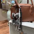 Chic tweed bow bag charm with mini handbag pendant and braided strap for purses. - Gray Bag Pendant